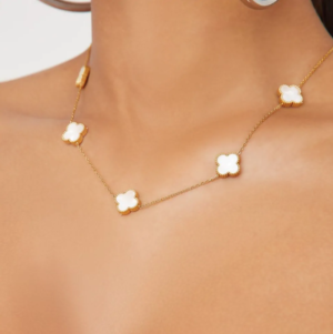 gold necklace with multi white flower details